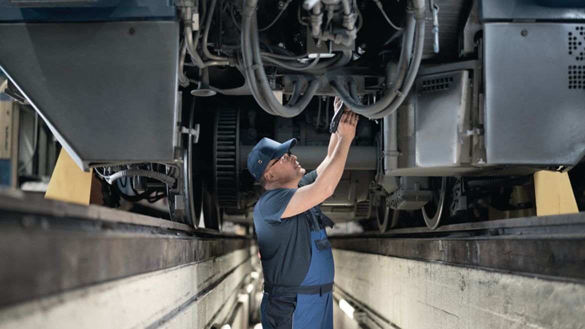 Man working on rail vehicle