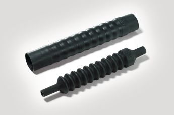 Adhesive lined heat shrink tubing with adapter lip connection for circular grooved adapters