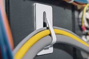 Steel cable clamp, self-adhesive